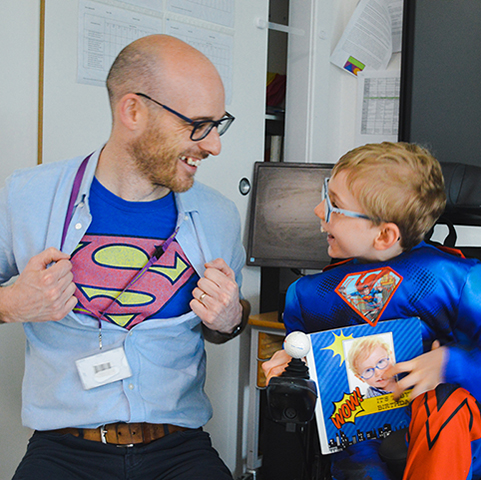 World Book Day student with Superman costume and staff member with Superman top